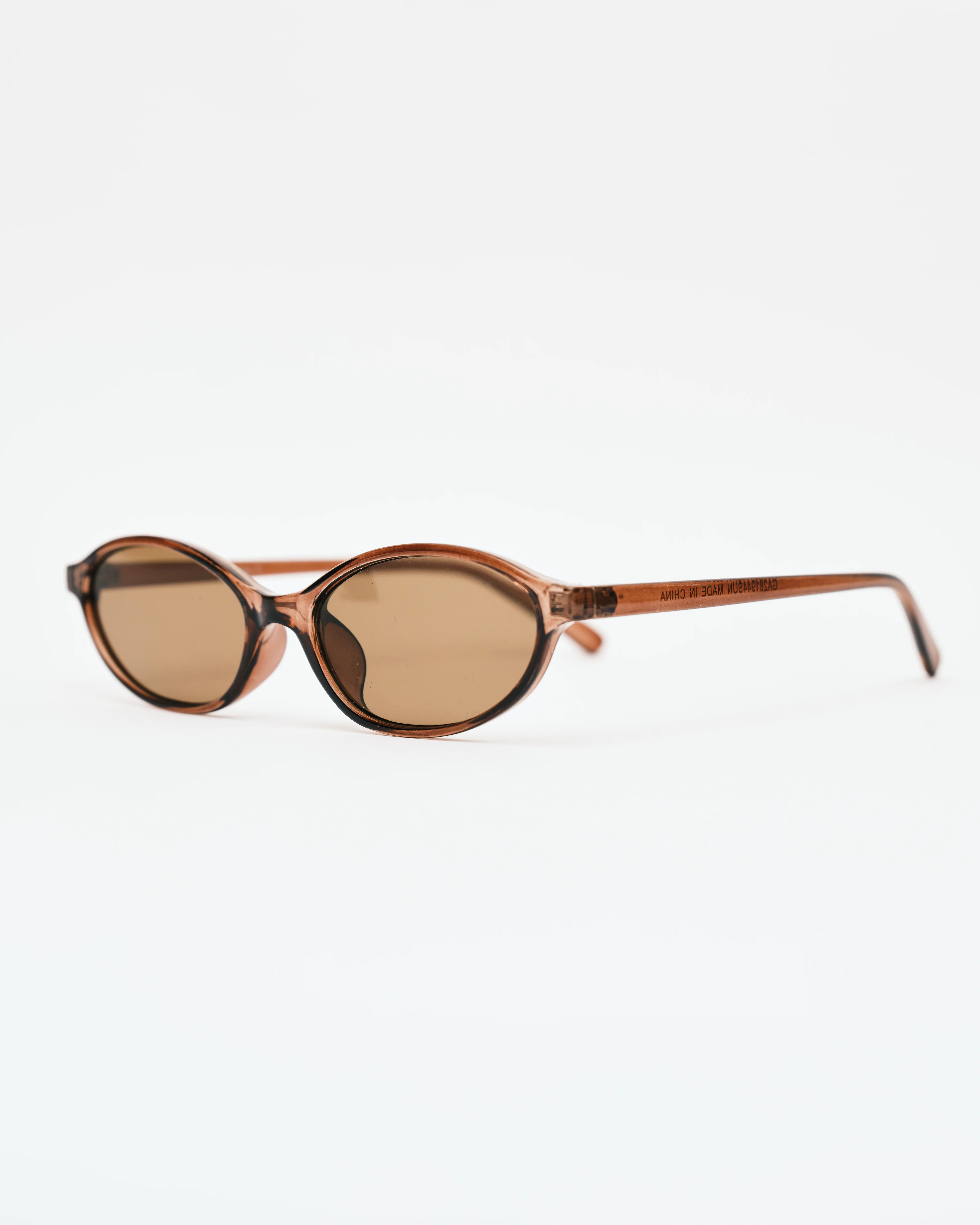 Thin Oval Sunglasses Oval Sunglasses in Brown